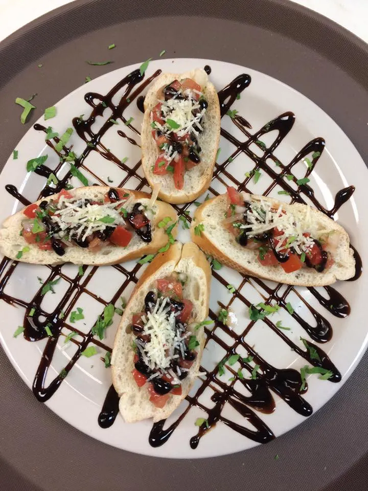 Tomatoes, mozzarella and basil with balsamic drizzle